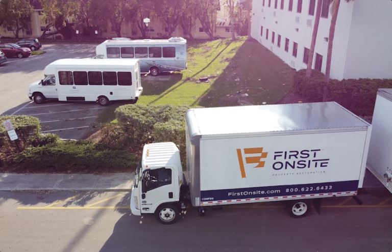 Fleet of First Onsite Property Restoration trucks