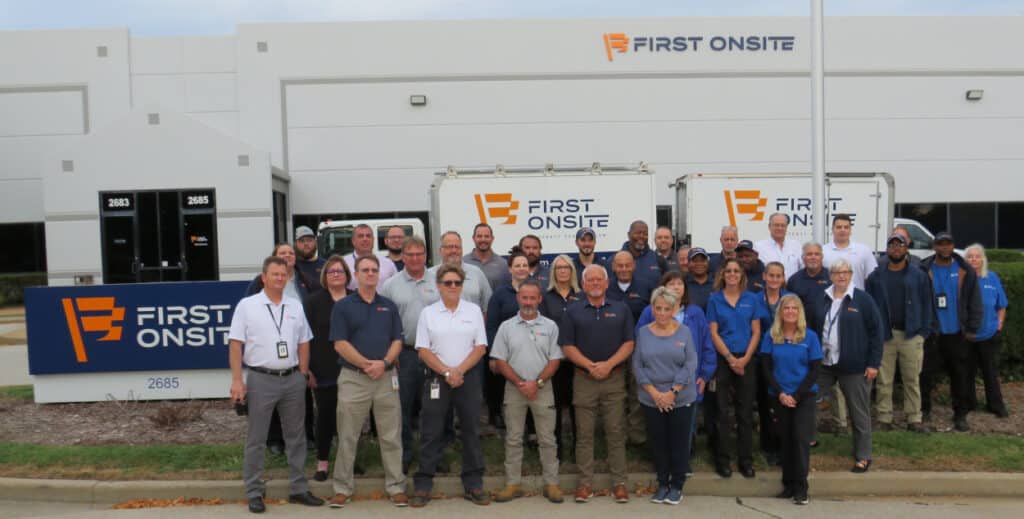 fos stl group shot 1 in front of building 9 2022