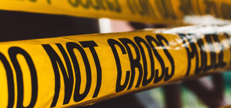Do not cross police signage at crime scene cleanup