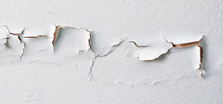cracking paint on wall from high humidity